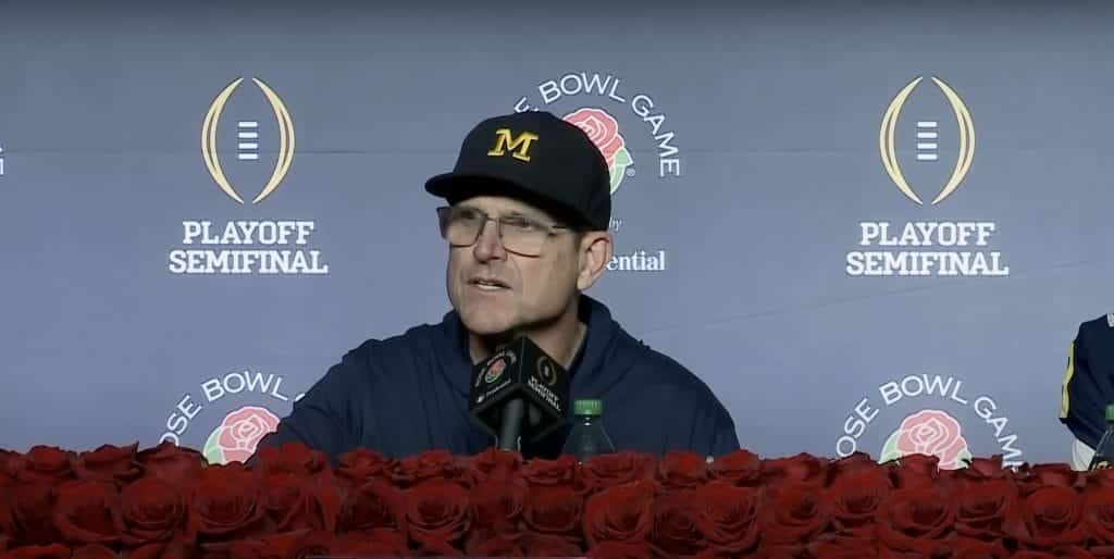 Jim Harbaugh at a press conference